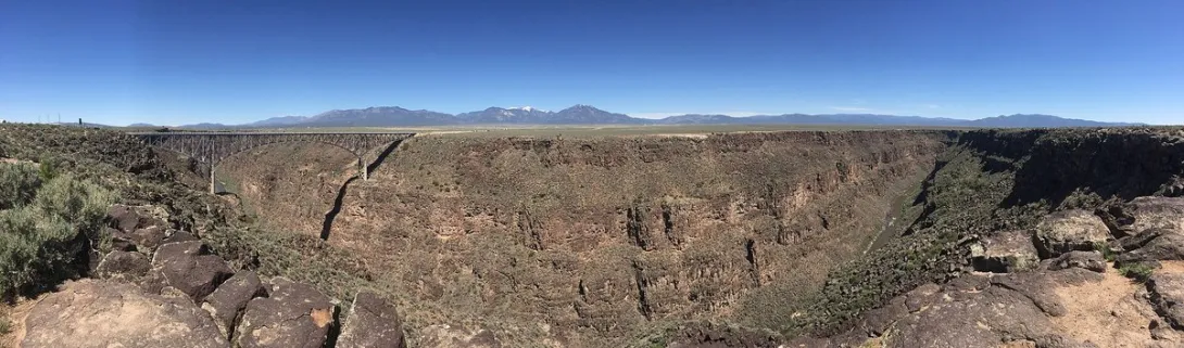 The Rio Grande Gorge near Taos, New Mexico, with the Gorge Bridge spanning the canyon above the river.